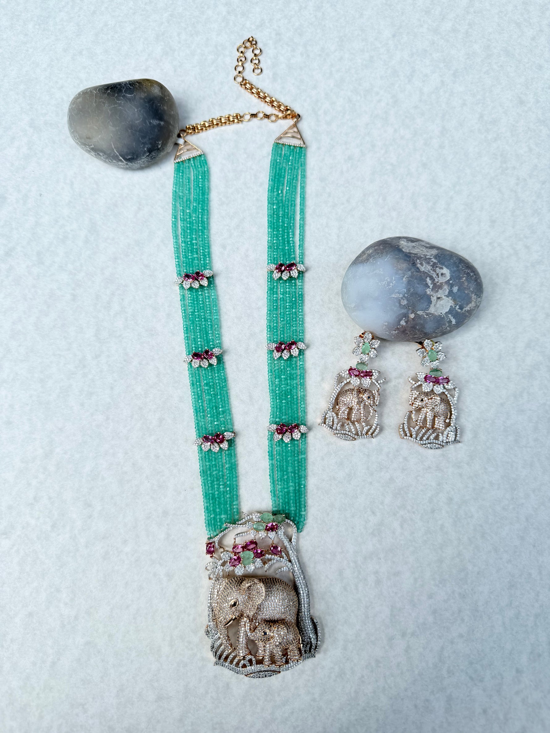 Multi-Strand Teal Bead Necklace with Elephant Motifs